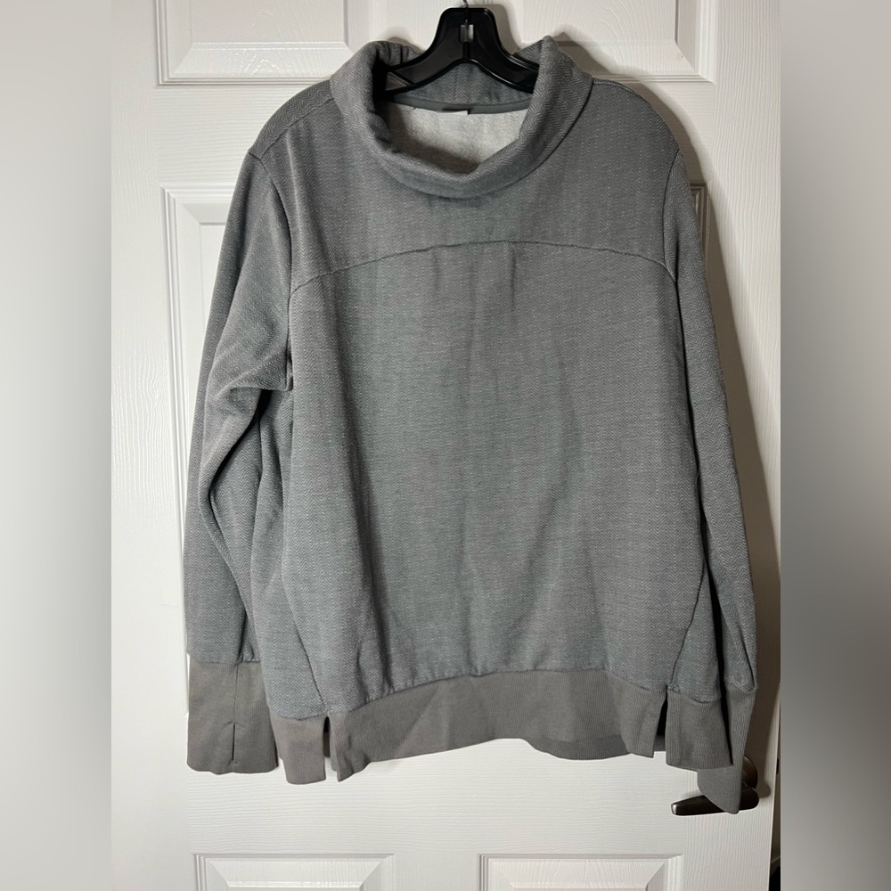 Grey athletic sweatshirt.